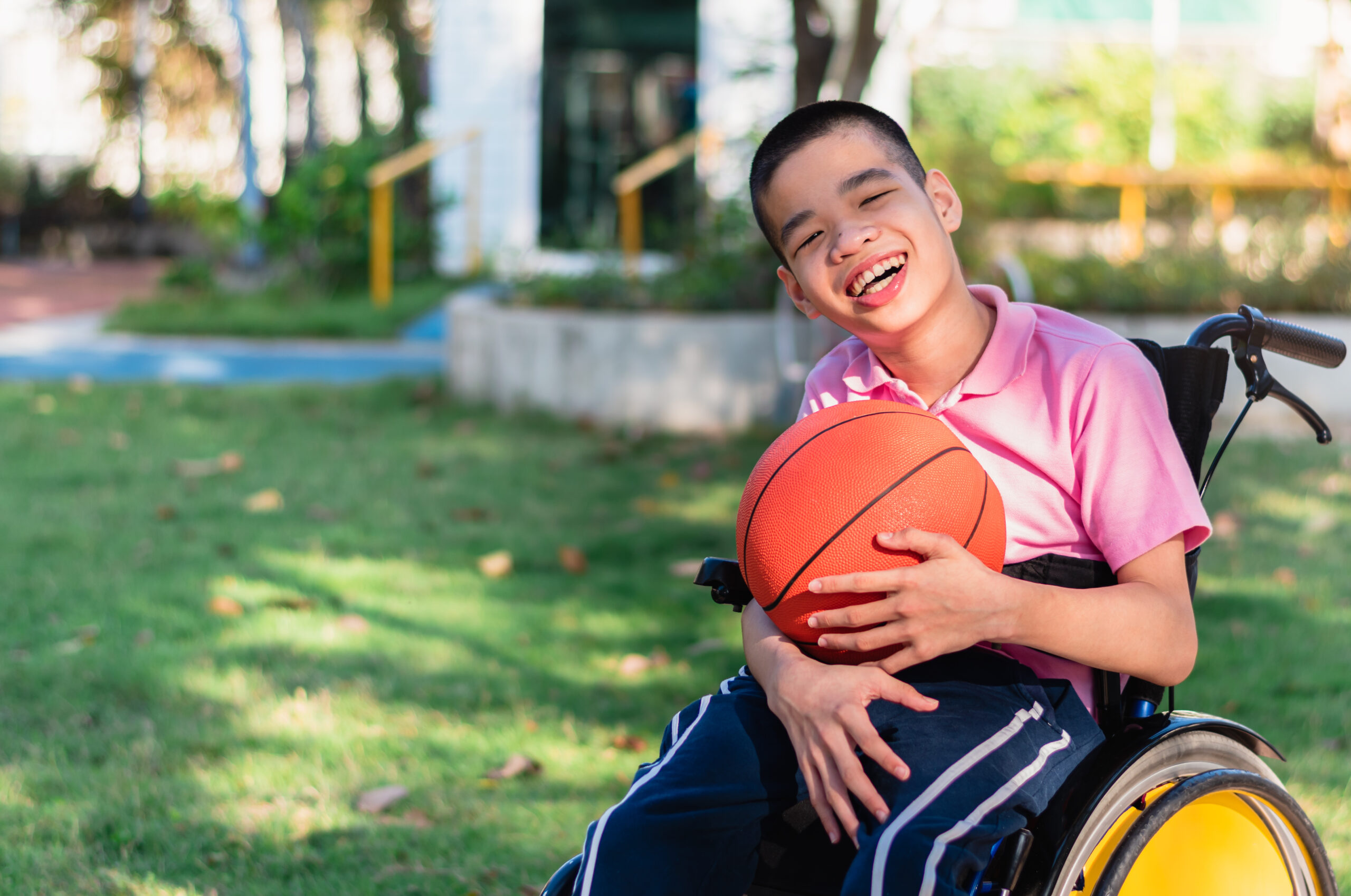 Asian,Special,Child,On,Wheelchair,Is,Playing,Basket,Ball,To