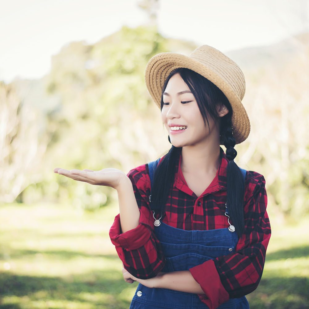 farmer-woman-standing-at-farming-UG3XZ7S.jpg